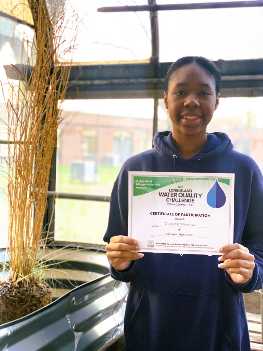  Chelsea Drummings with the LI Water Quality Challenge certificate.