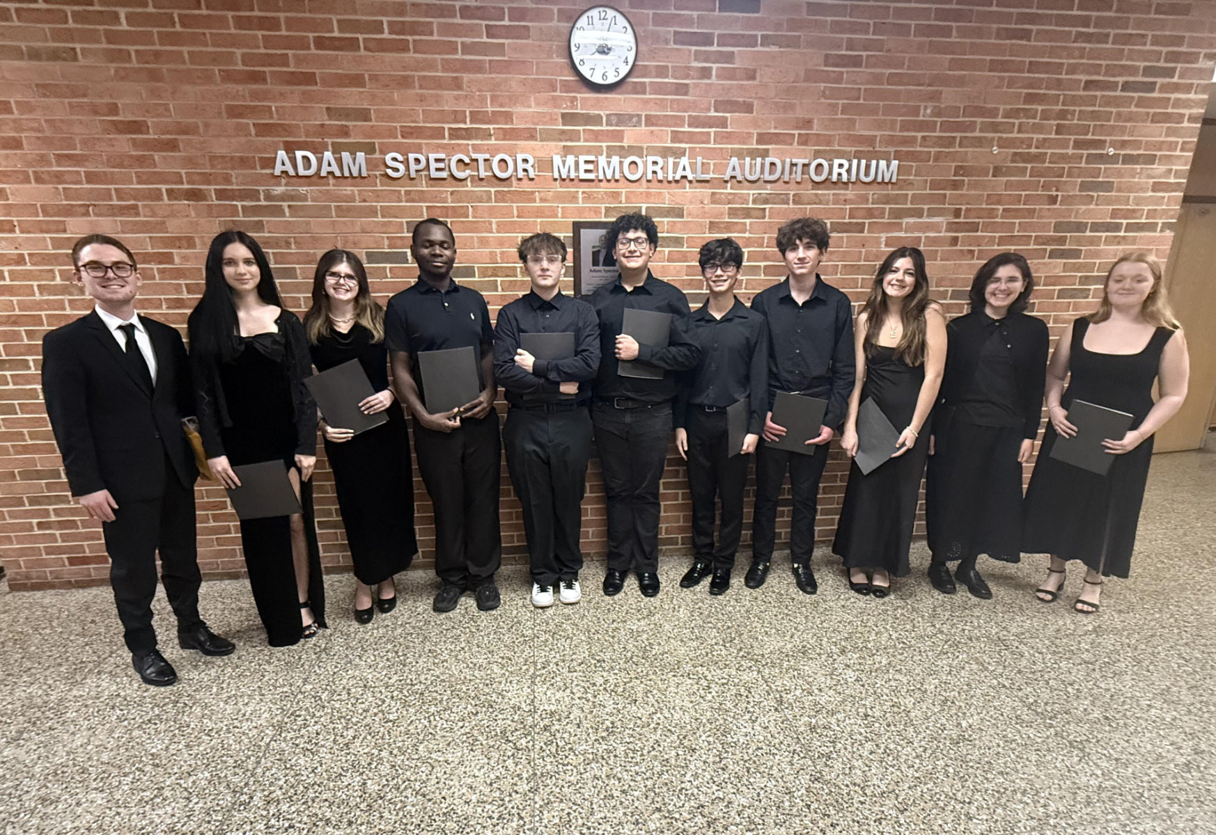  The Huntington chamber choir performed at the school board meeting.  