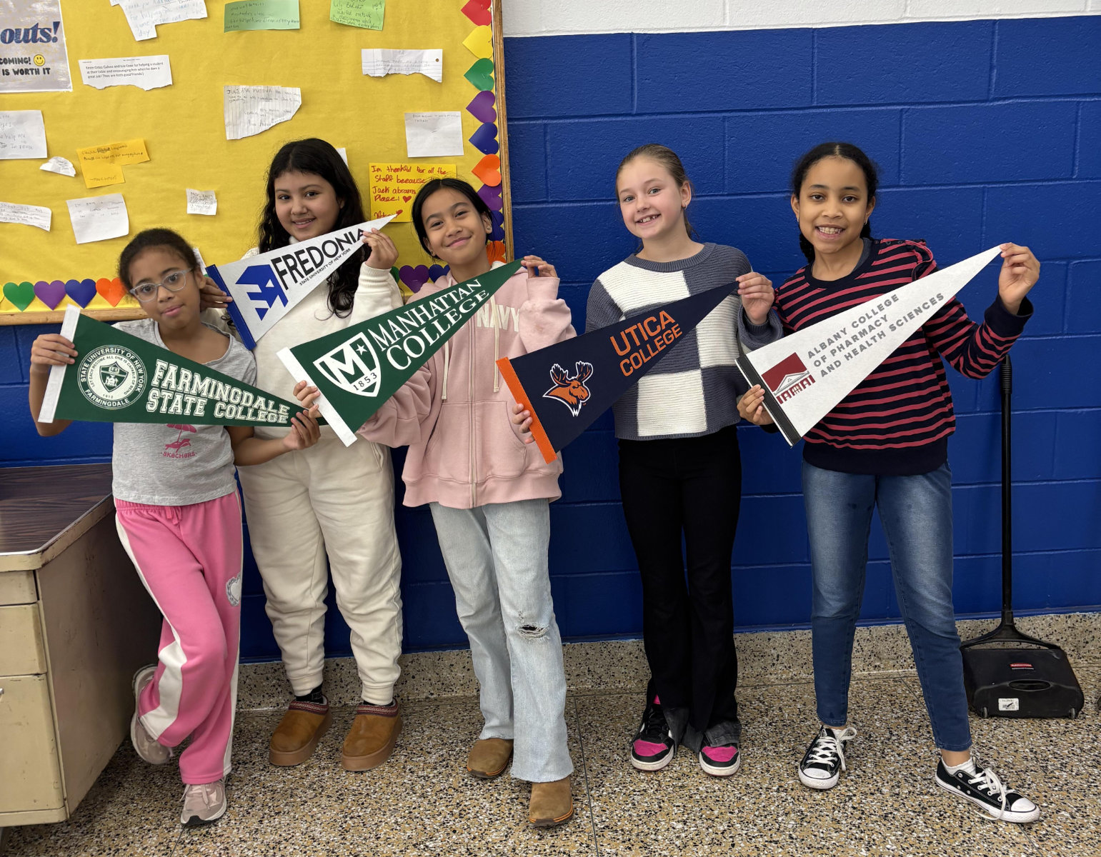  Jack Abrams School students show off some of their college favorites.  