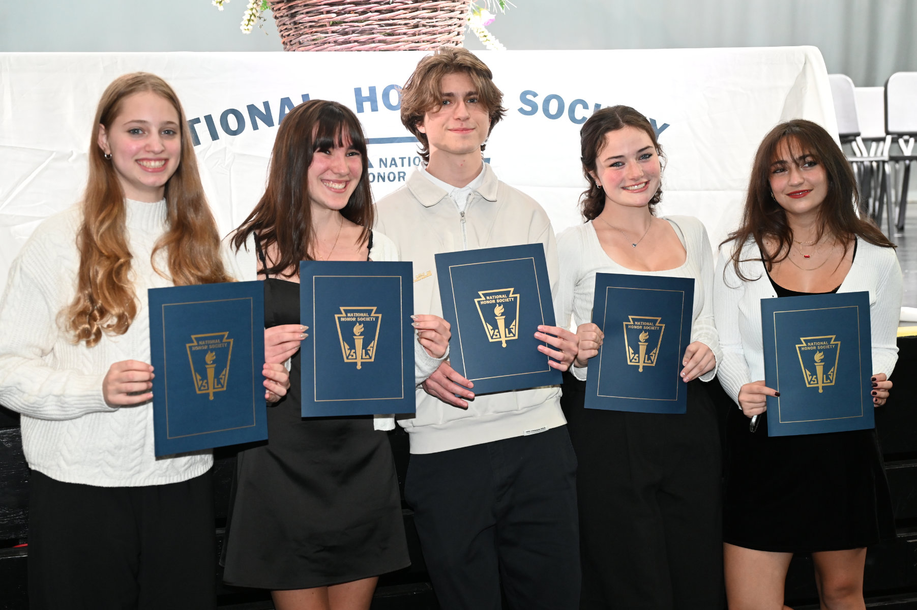 Huntington's National Honor Society chapter inducted more than 70 new members