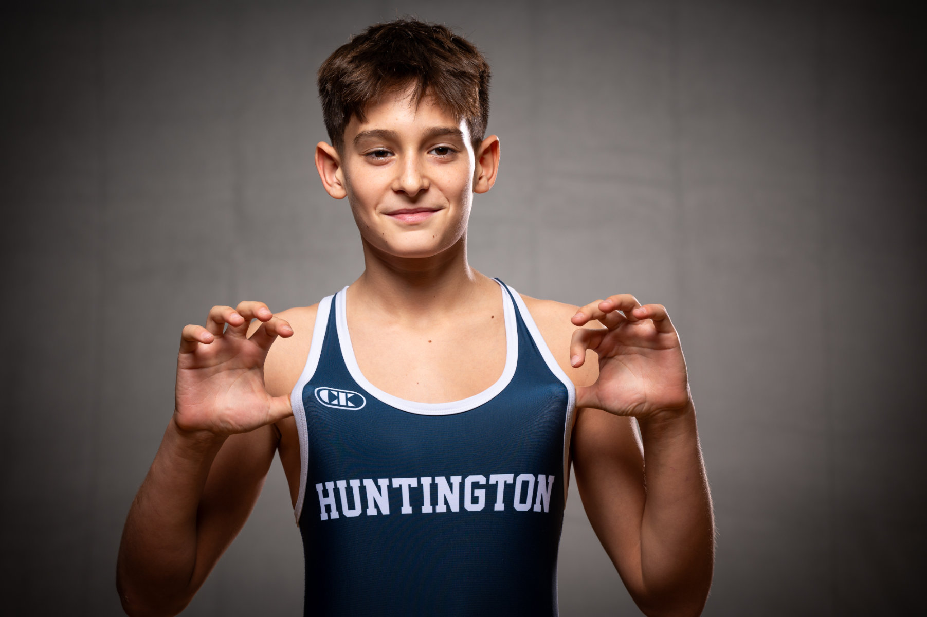  Seventh grade varsity wrestling phenom Jason Bencivenga shows where his loyalties lie. (Darin Reed photo.) 
