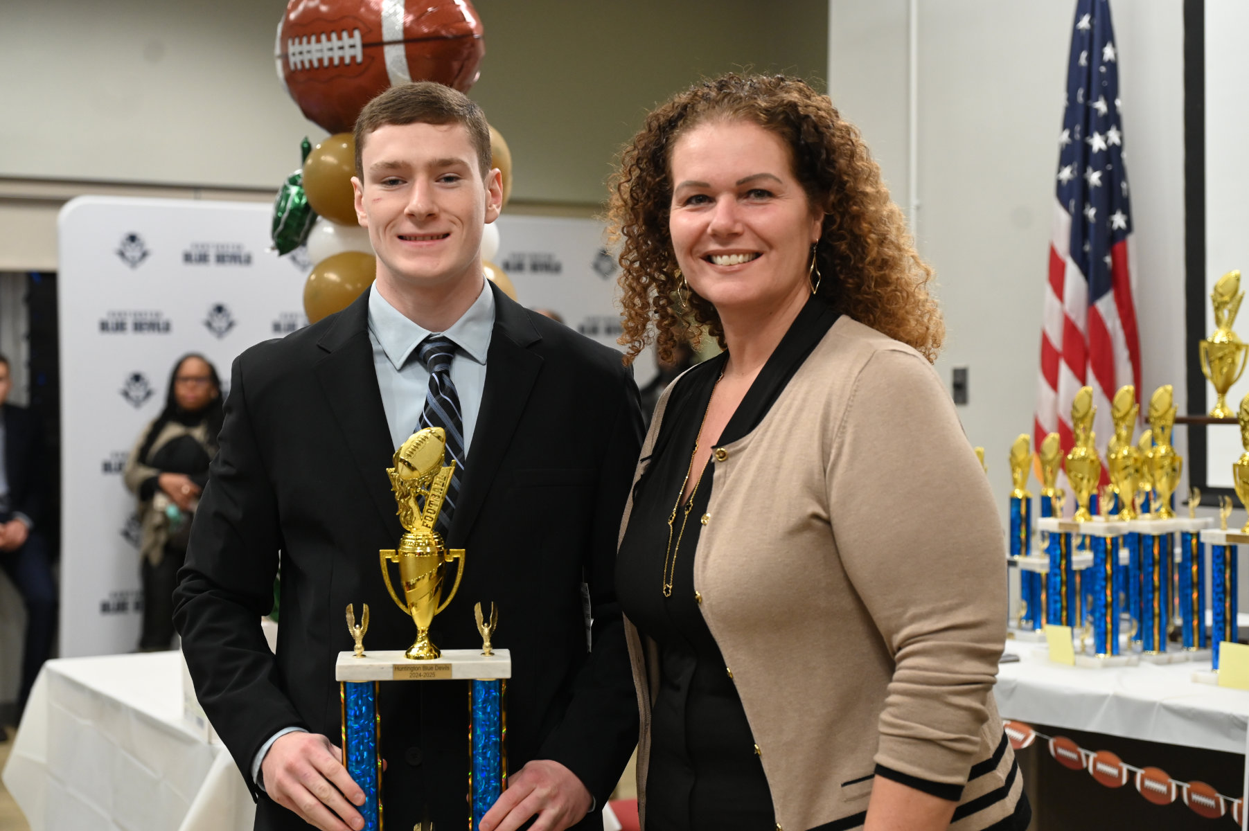 Senior Thomas Smith with Superintendent Beth McCoy
