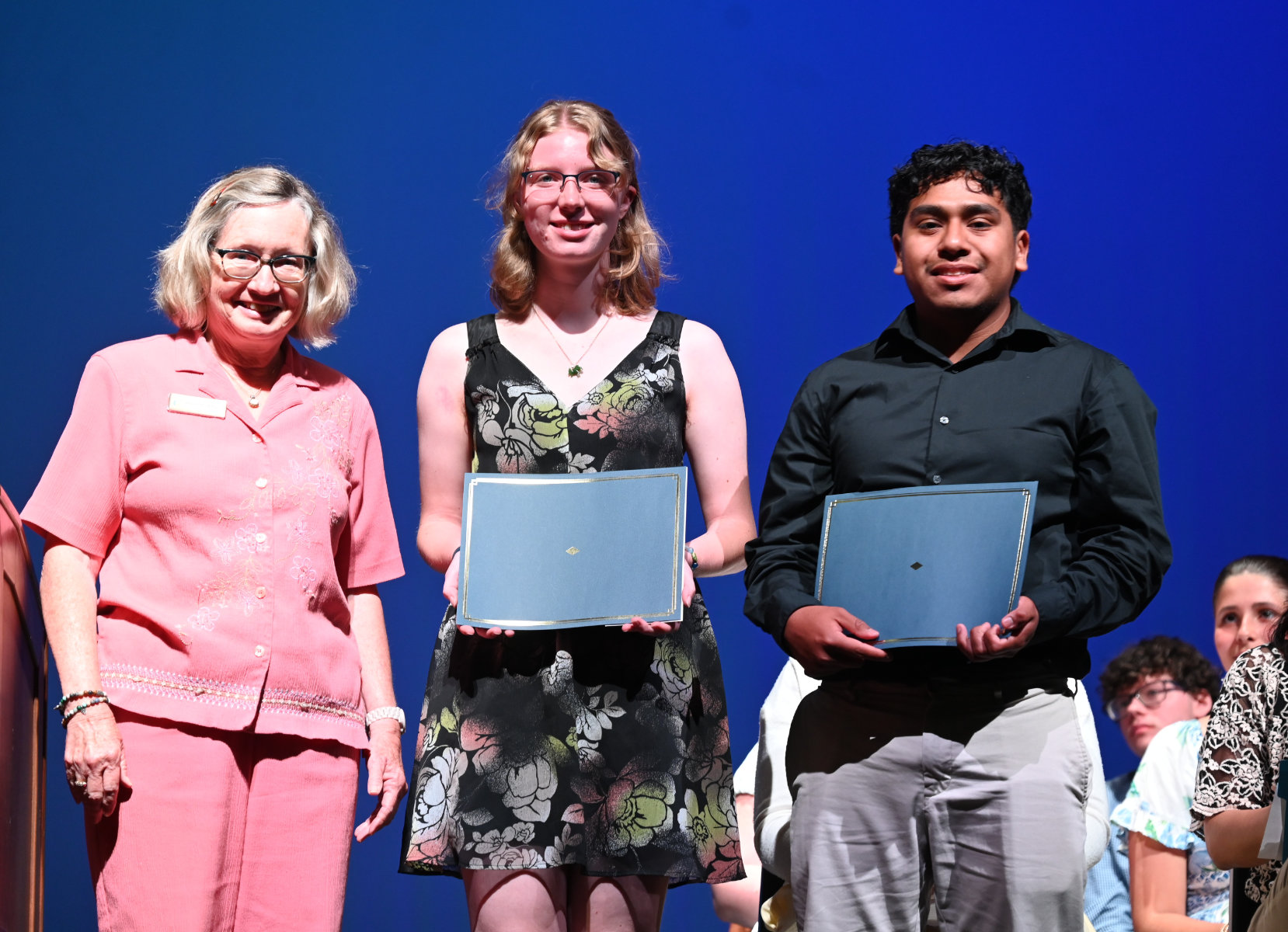  Library Director Joanne Adams presents awards to Amalia Heinz and Edgar Vidal-Villalba (1) 