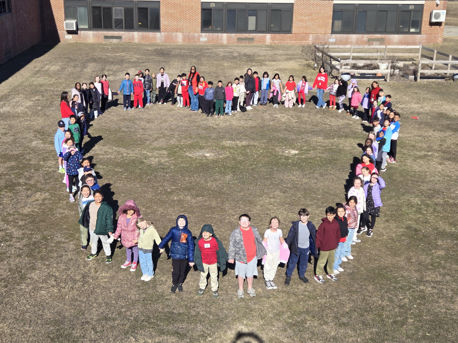  Washington third graders enjoyed outdoor exercise before forming a heart.  