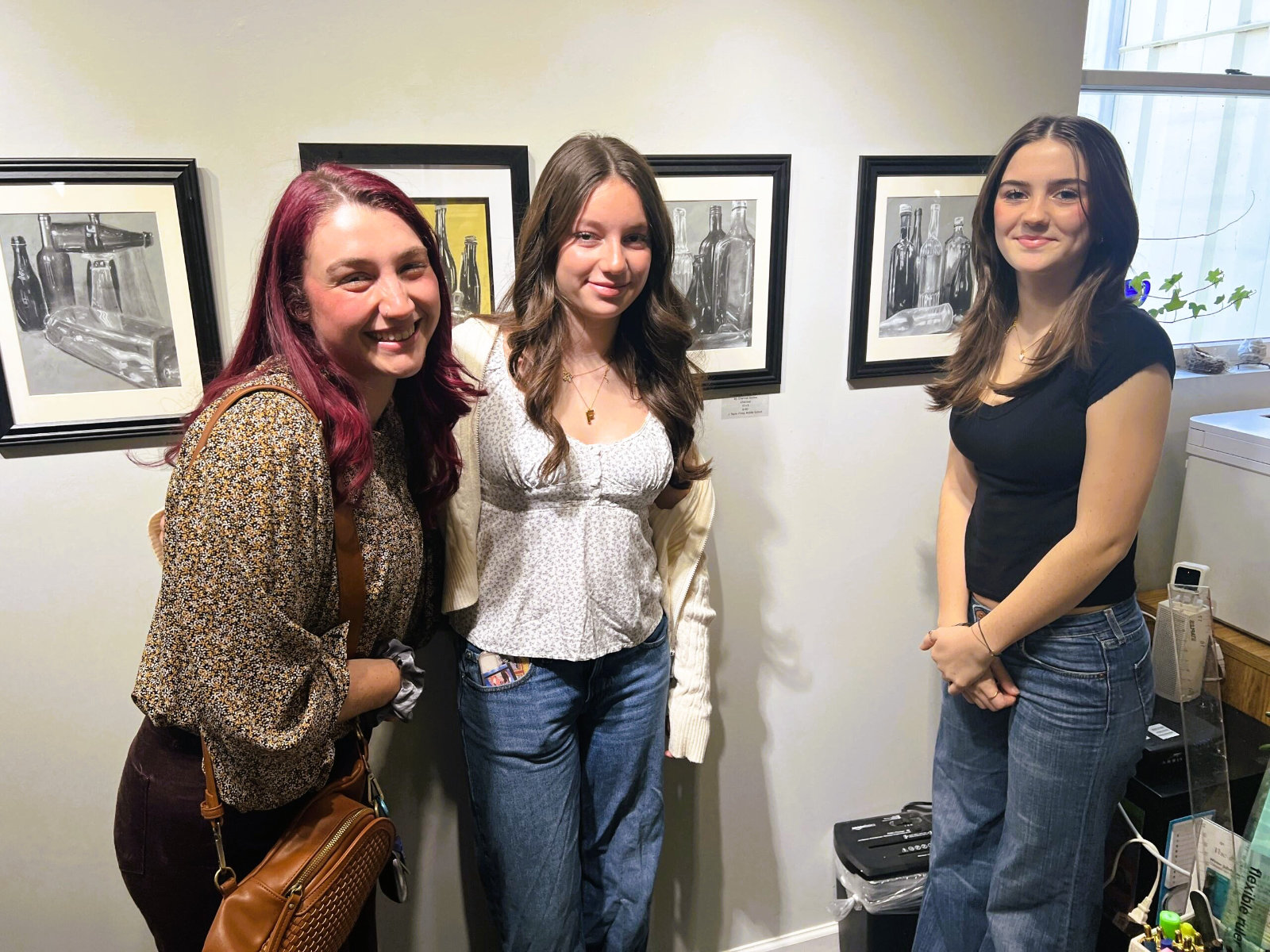 Finley artists joined teacher Jessica Simms at the reception for the exhibit.
