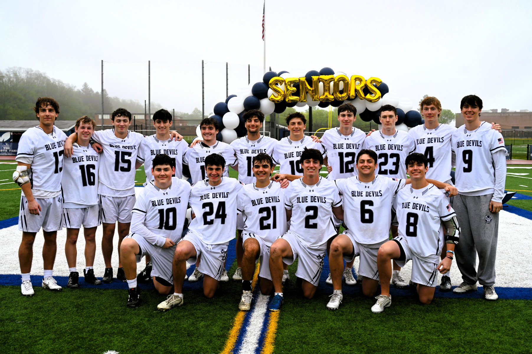  The Huntington varsity boys' lacrosse team's seniors gathered for a photo on their special day.  