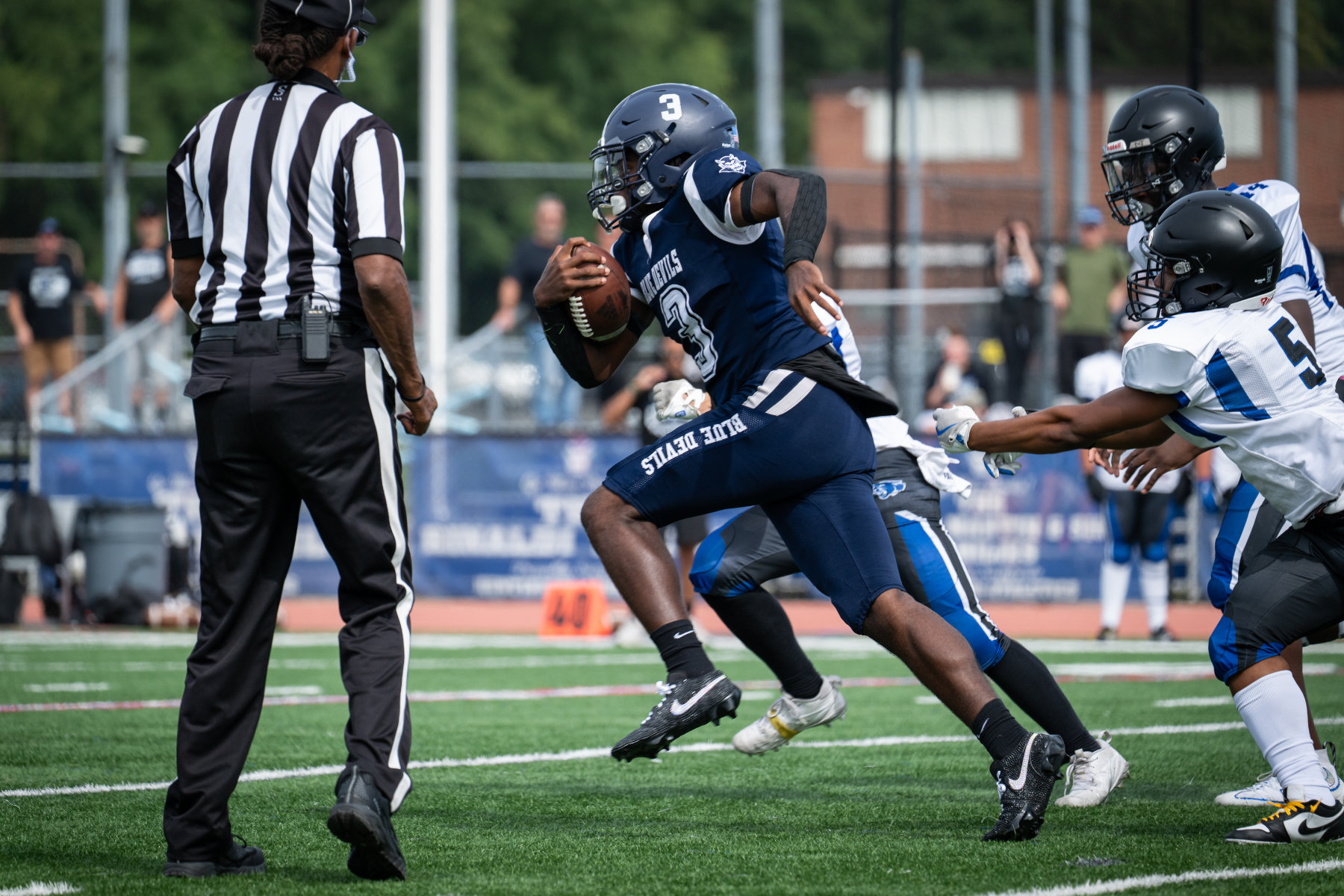 Yasir Jones breaks through the defense on his way to another touchdown. (Darin Reed photo.) 