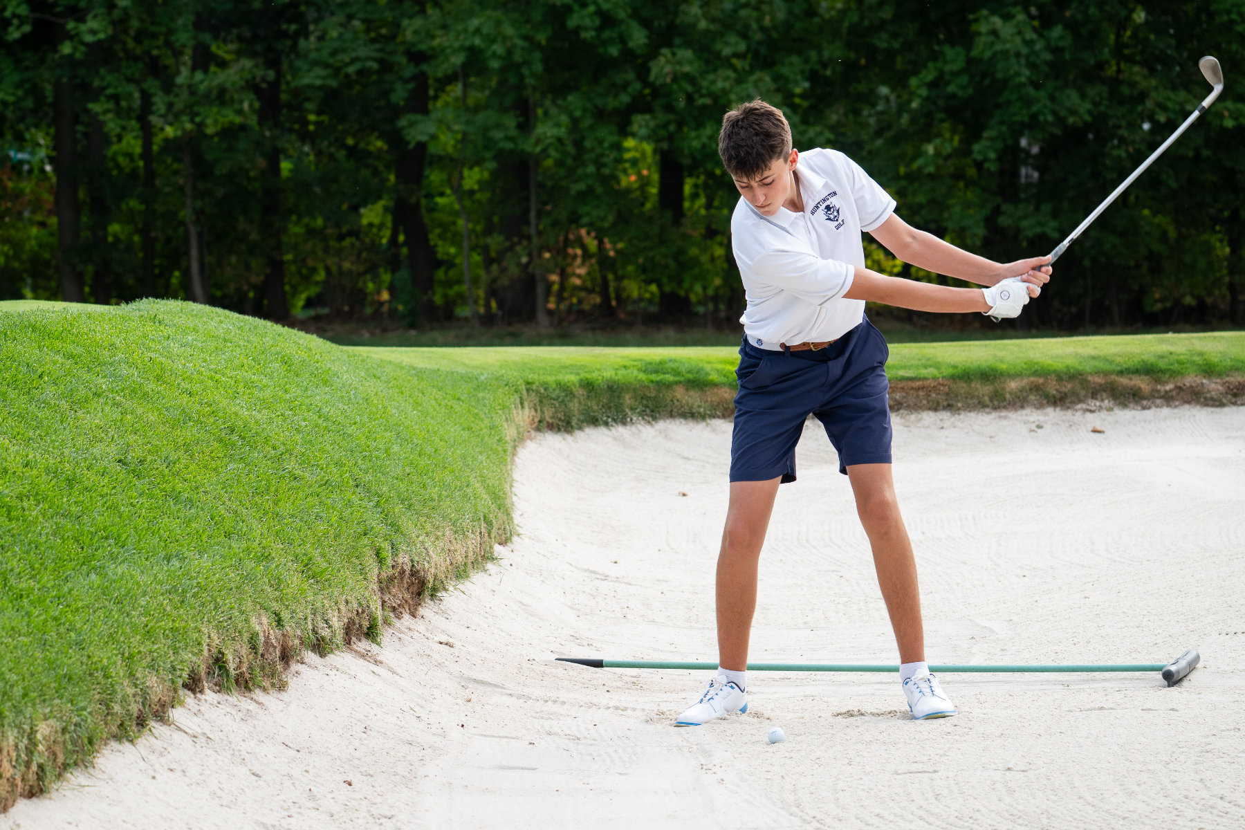  Conference I champ Jack Corcoran chips out of the sand trap. (Darin Reed photo (2) 
