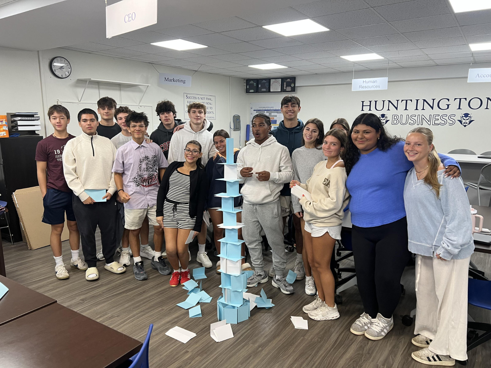  Clean Clip corporate team members in the Virtual Enterprise room at the high school.  