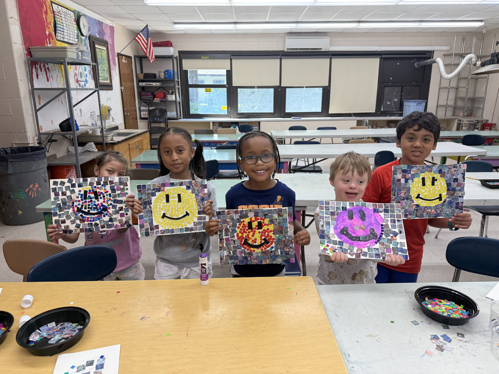  Extended year program student-artists proudly display their work.  