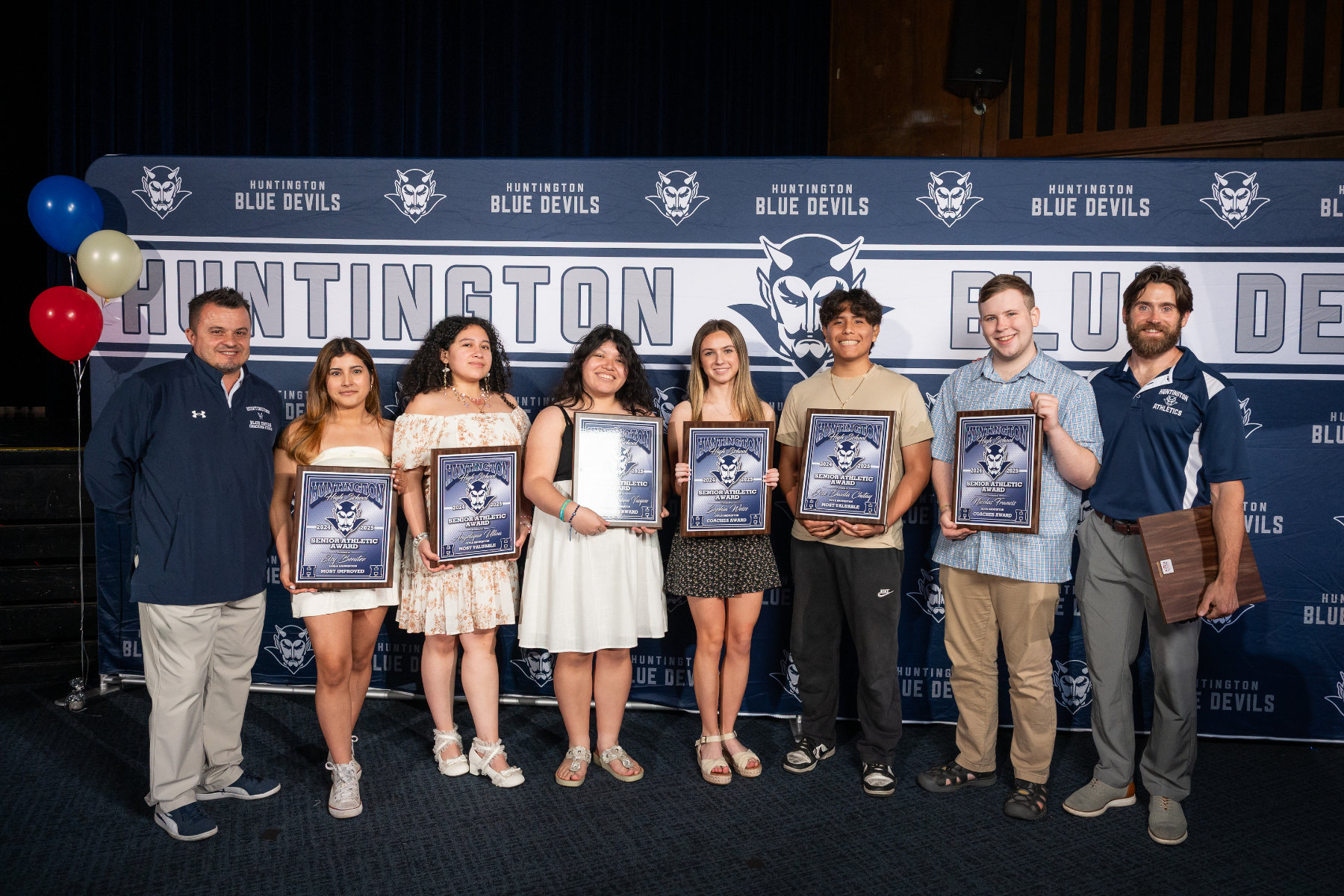  The top boys' and girls' badminton team seniors with coaches Andy Marlow and Alex Nelson. (Darin Reed photo.)  