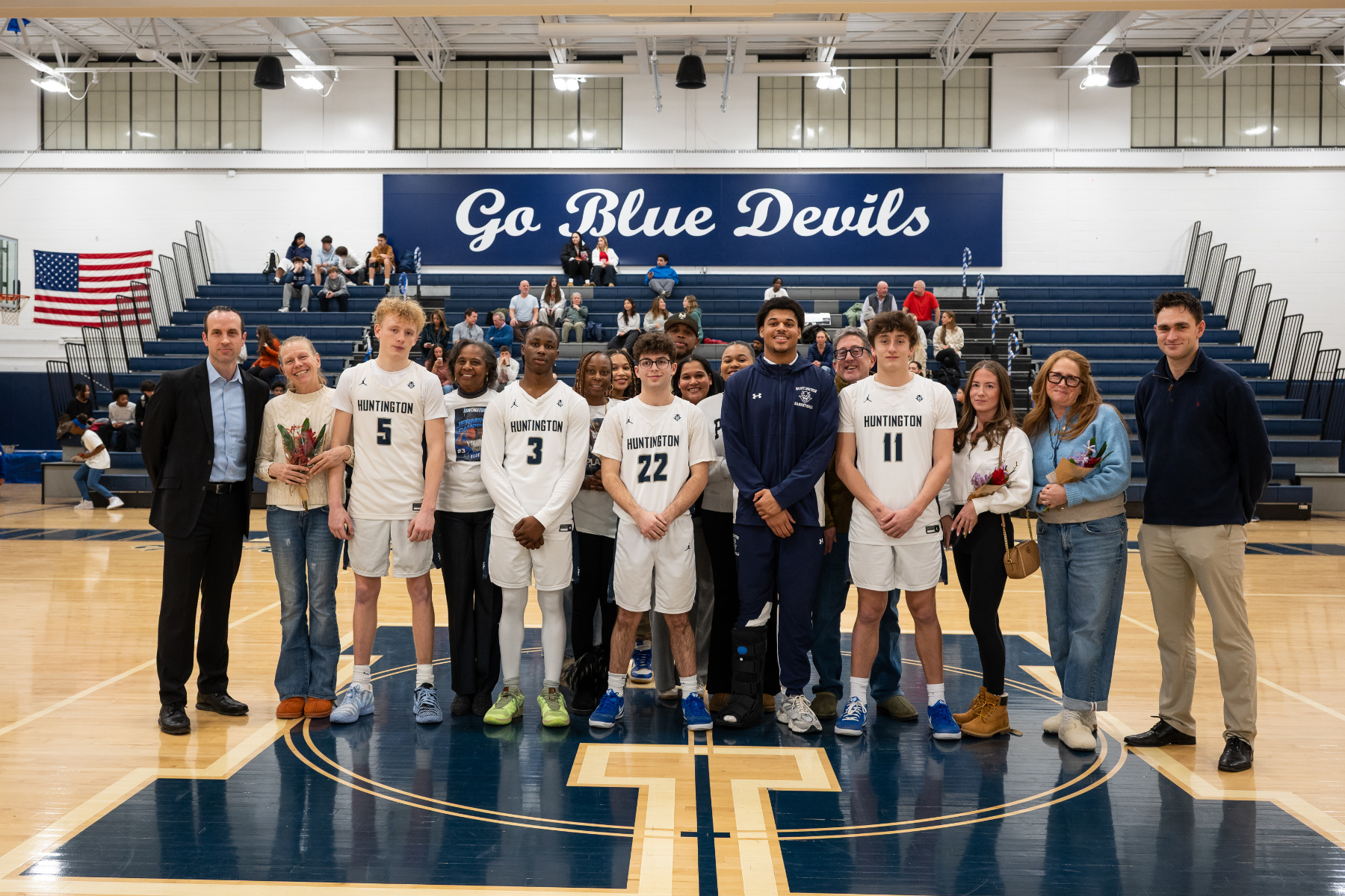  The seniors, their families and coaches in the Huntington gym. (Darin Reed photo.)  