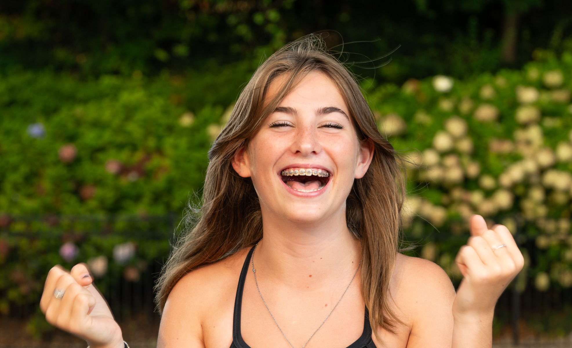 Lena Sullivan is a happy Blue Devil track star. (Darin Reed photo.)  
