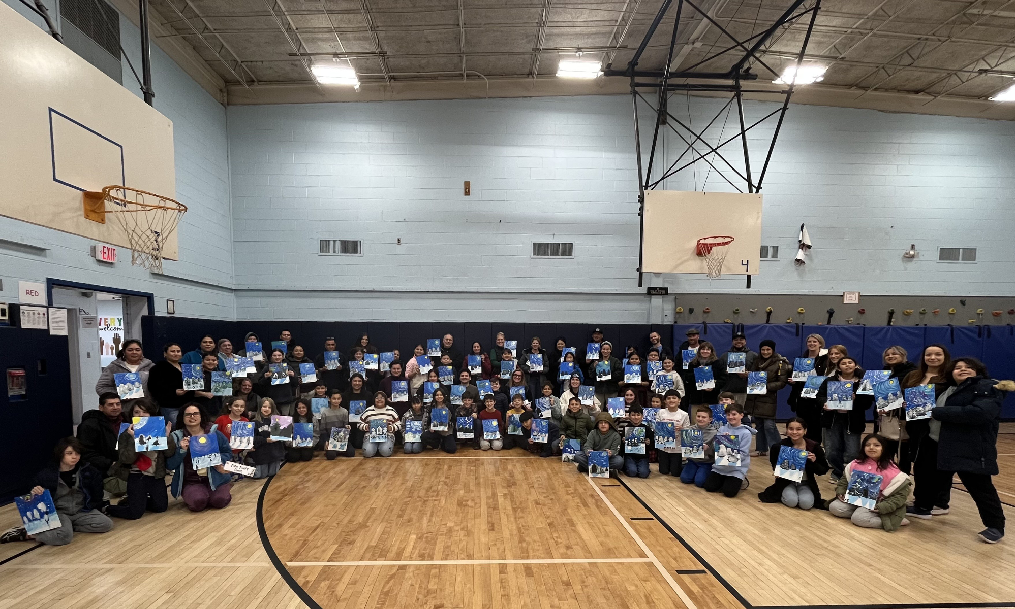  The big crowd showed off its work in the school gym.  