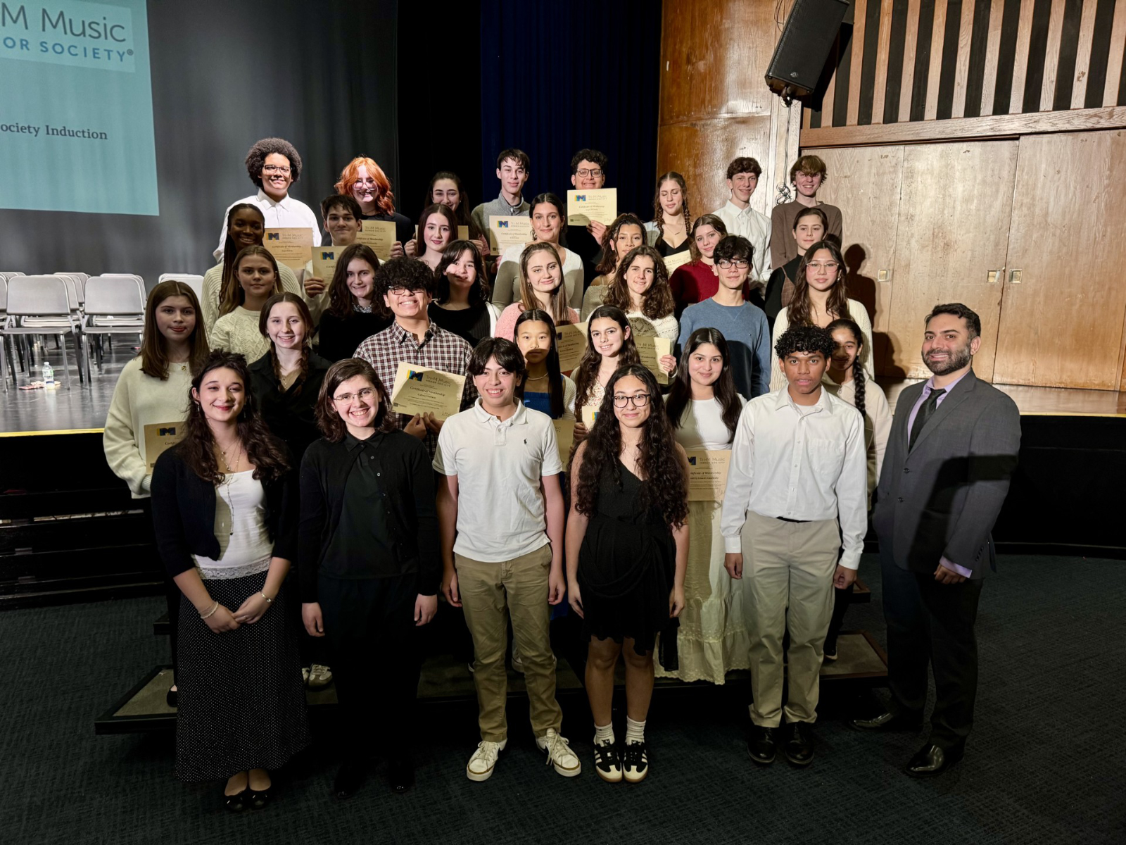 The new Tri-M Music Honor Society inductees with faculty advisor James DiMeglio. (Darin Reed photo.)