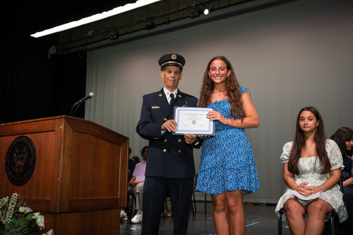  Grace Oliva earned the Huntington Fire Dept's Ex-Chief Edward McGaul Award for Business. (Darin Reed photo.) 