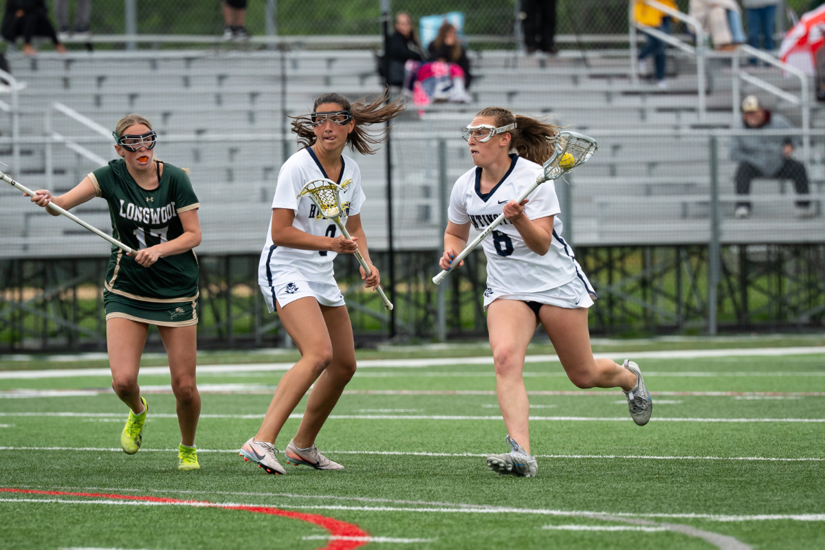  Jolie Weinschreider with the ball against Longwood this past spring. (Darin Reed photo.)