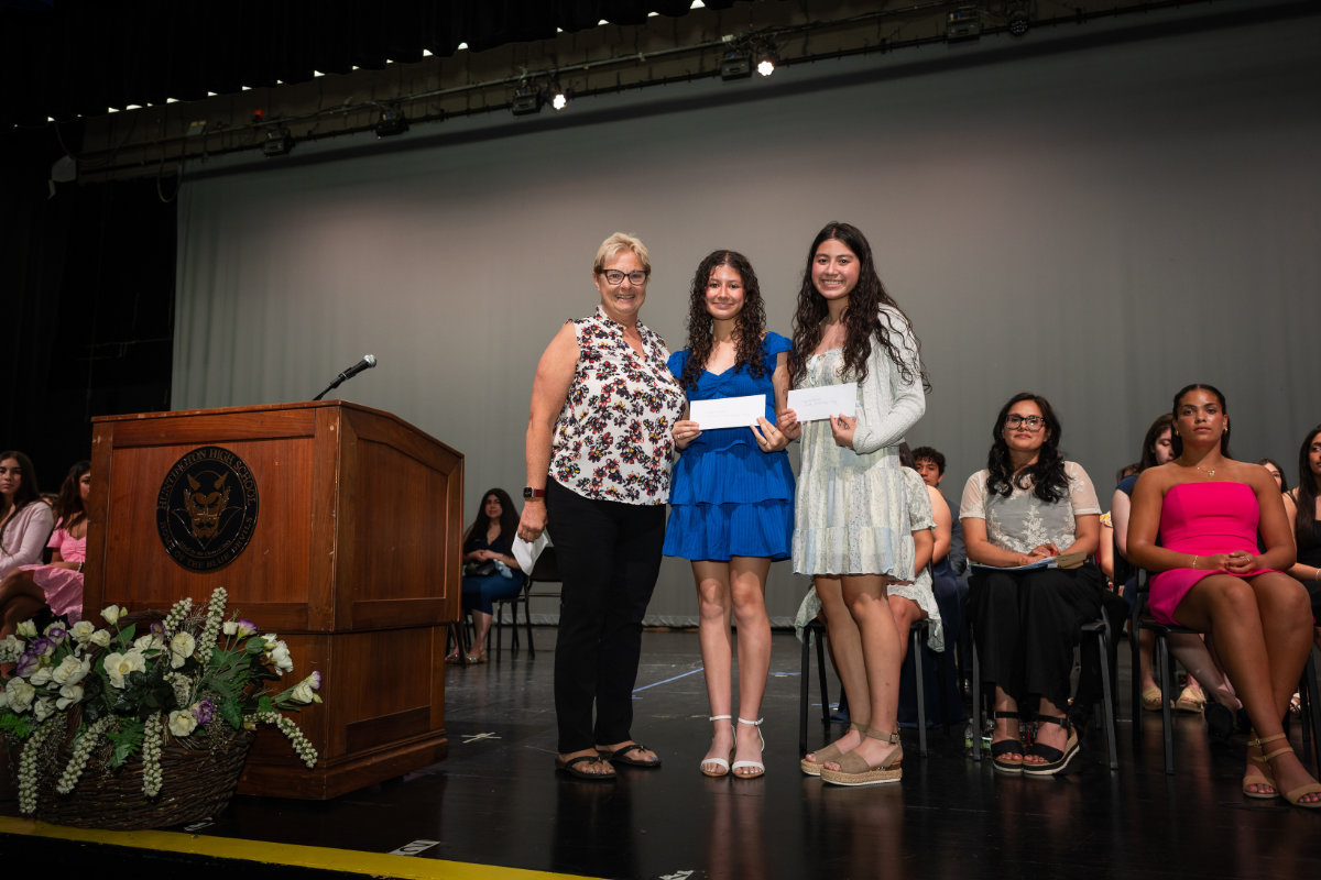 HARTE Pres. Martha Ironman with sister honorees Mildred and Erika Hernandez Valle. (Darin Reed photo.)