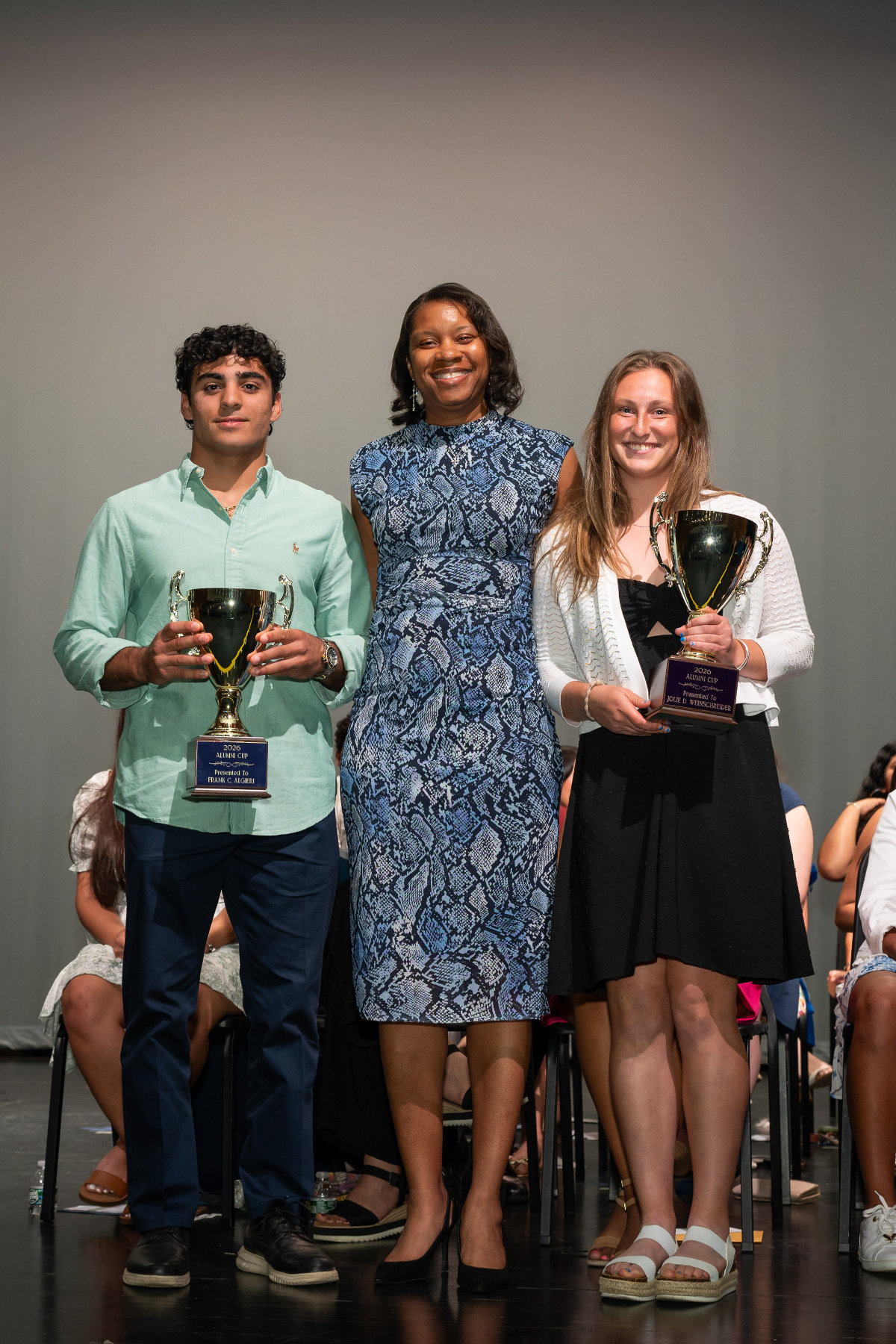 Frank Algieri and Jolie Weinschreider presented with Alumni Cup by Principal Rochelle C. Brown. (Darin Reed photo.)
