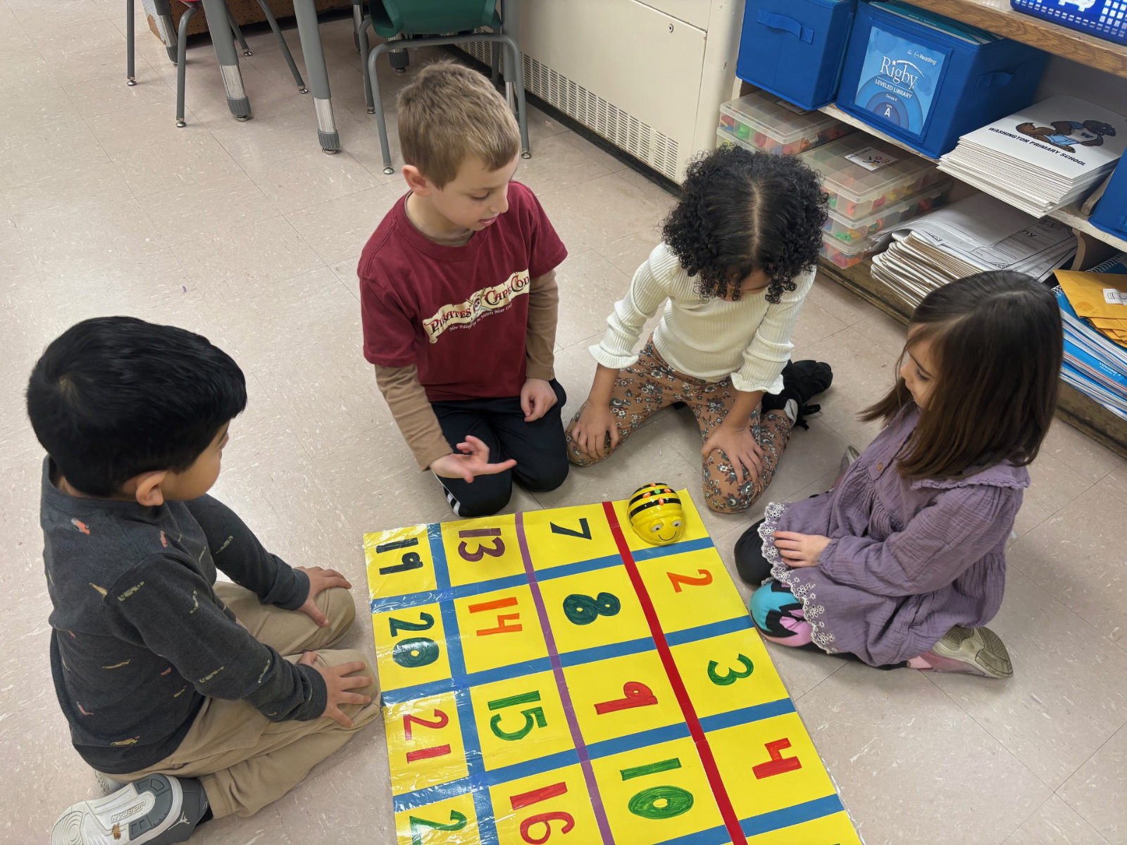 Washington students used bee bots to learn about basic coding.    