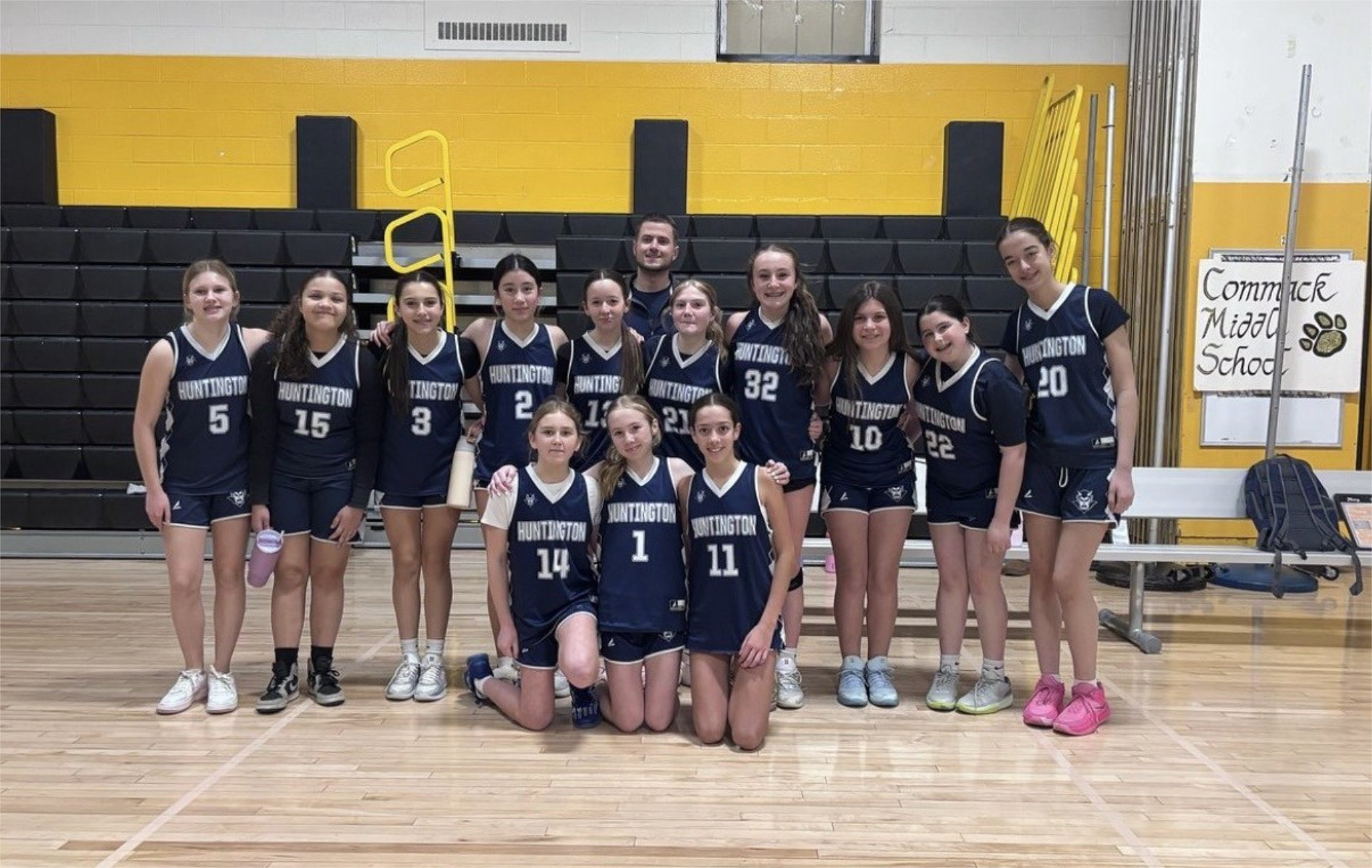  The Finley girls' basketball team coached by Cole Rudnick (back row center).  