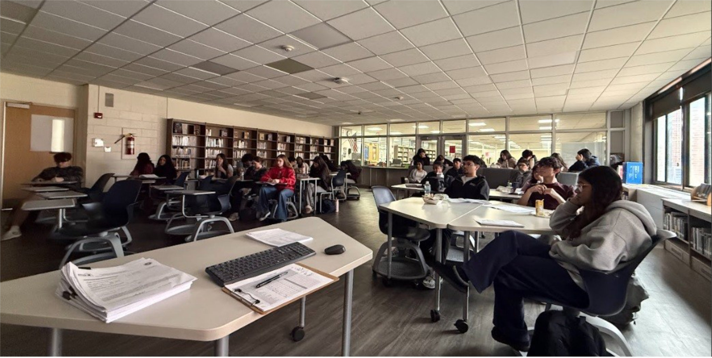 Students gathered in a library room to watch the surgery.  