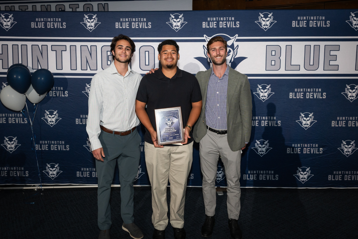  Peter Steen Scholarship winner Banny Soc Concua with Steen family members. (Darin Reed photo.)  