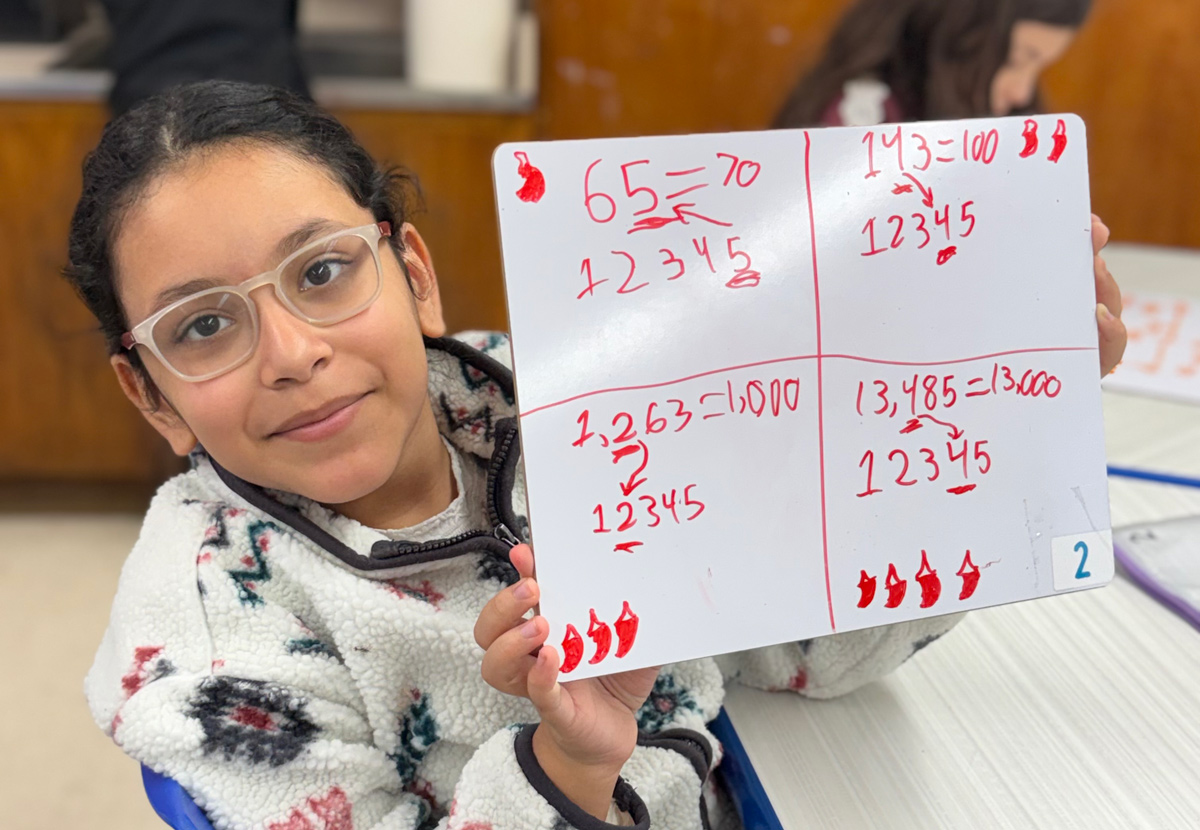  Fourth graders are loving math at Woodhull School  
